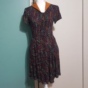 Super cute fitted vintage dress.. I believe 60s